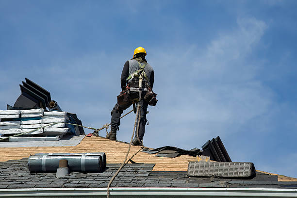 Professional Roof Replacement technician working in Amesbury, MA